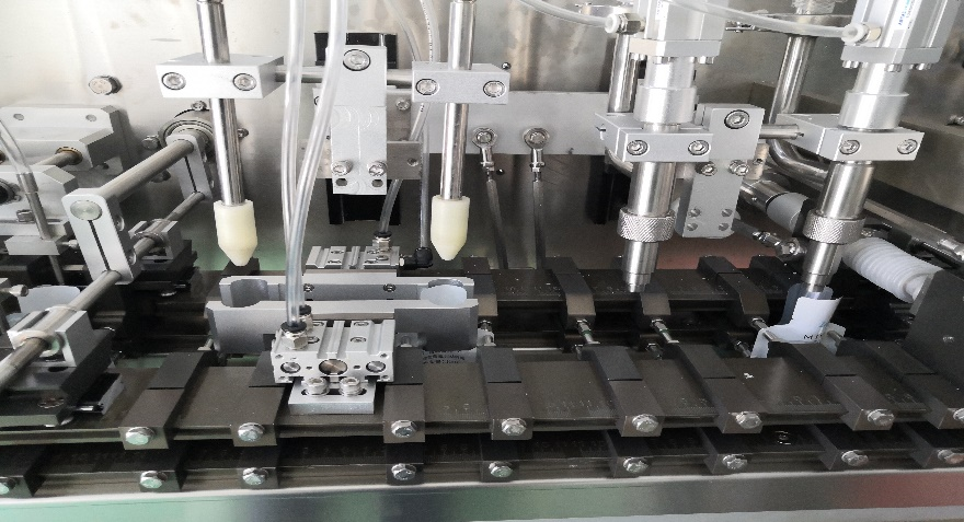 &Ouml;zelleştirilmiş &ouml;zel torba a&ccedil;ma ve &uuml;fleme cihazı, &ccedil;ift kafalı dolum makinesi